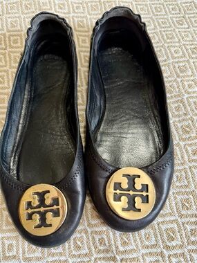 Tory Burch Black Leather Flats with Gold Logo Medallions